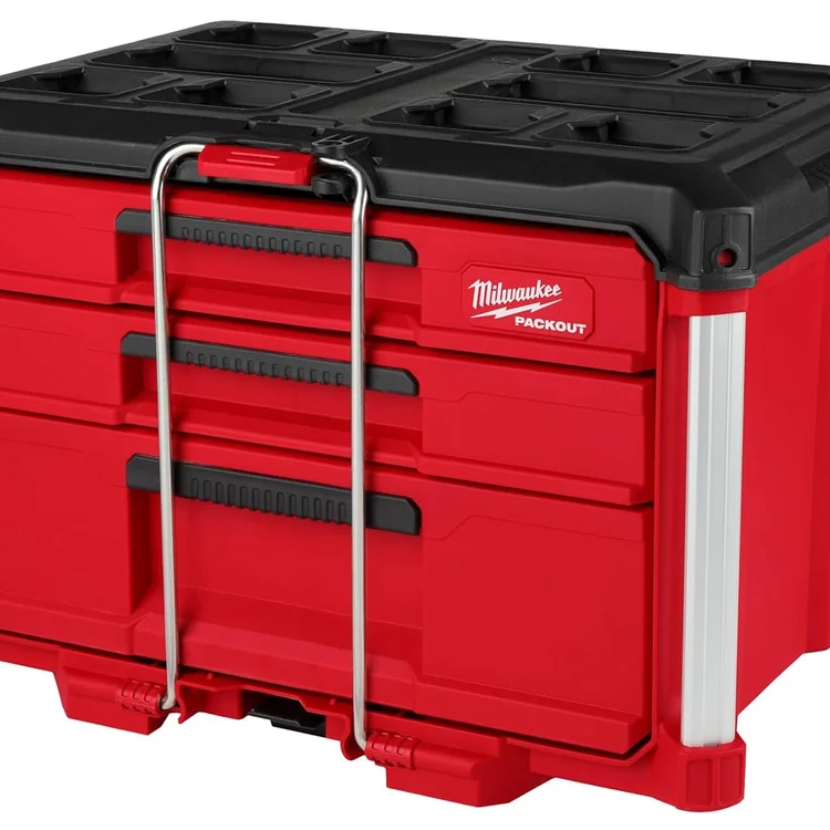 Red Milwaukee Packout portabletoolchest with three drawers and metal handle